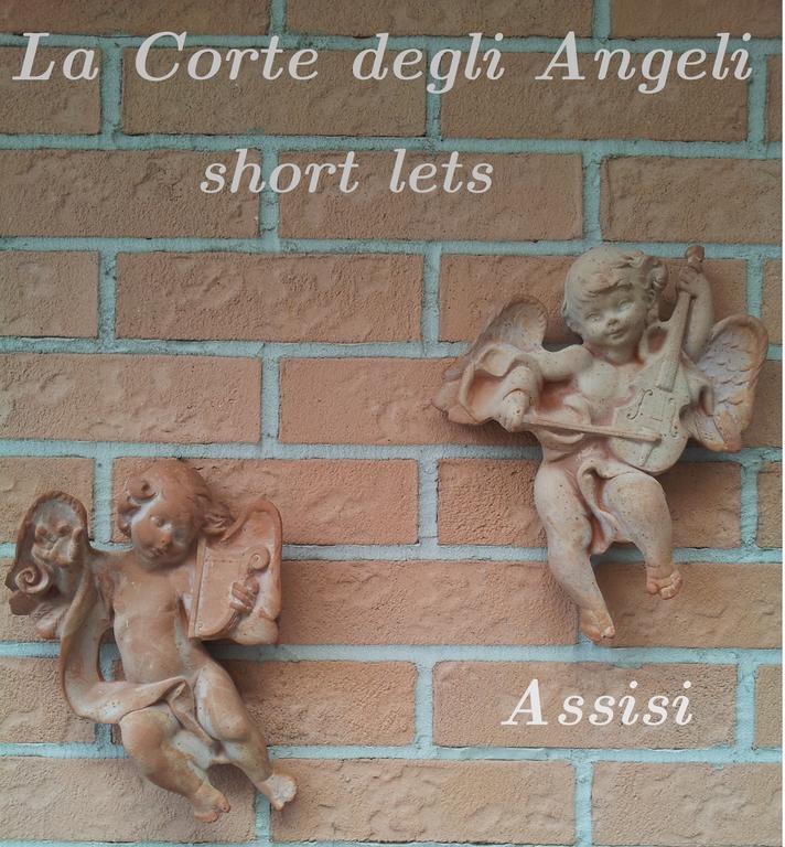 La Corte Degli Angeli Locazioni Turistiche Assisi Pokoj fotografie